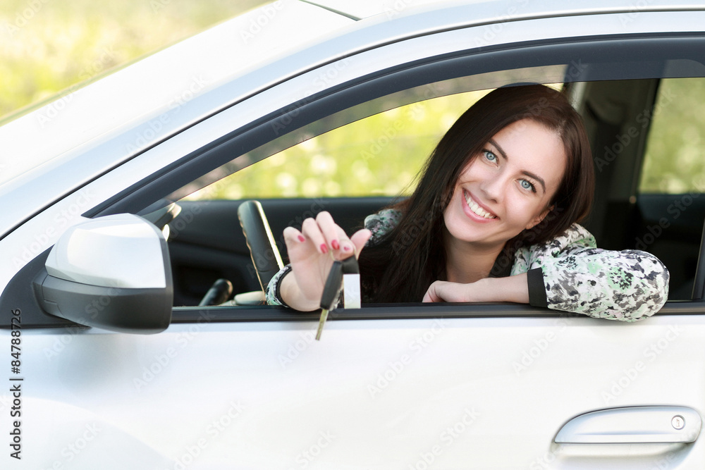 Young woman driving  car