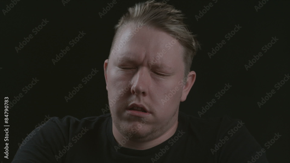 Man's face is blown in wind Man's face is blown in wind