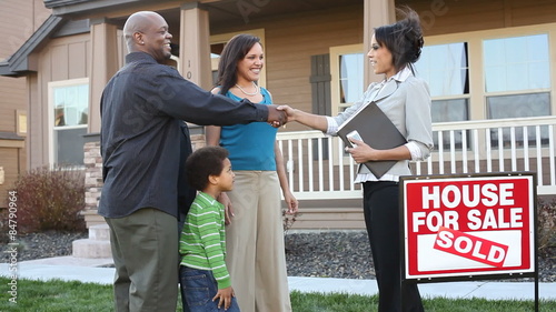Happy African American family buy a house 