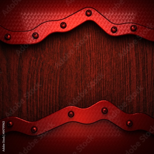 red pollished metal on wooden bachkround photo