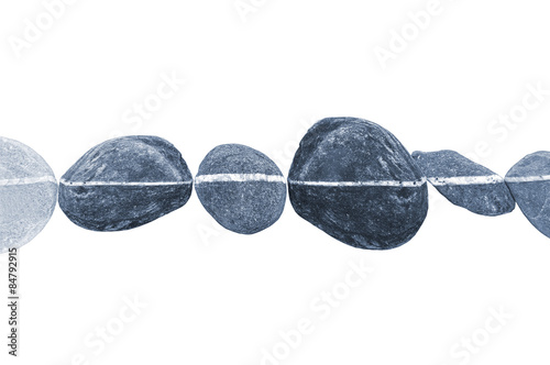 Photography Horizontal line of stones, isolated on white background