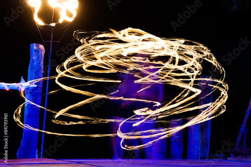 Abstract light trails during night fireshow