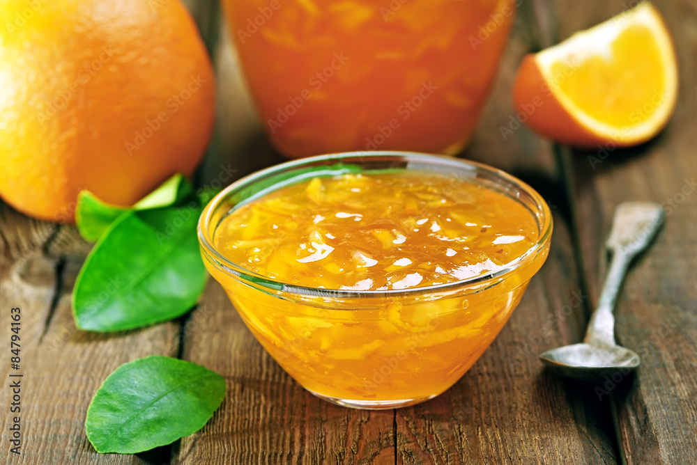 Orange jam on wooden table Orange jam on wooden table