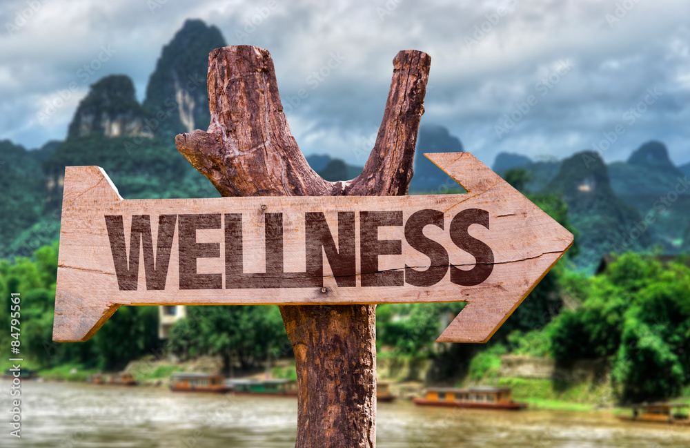 Wellness direction sign with exotic background