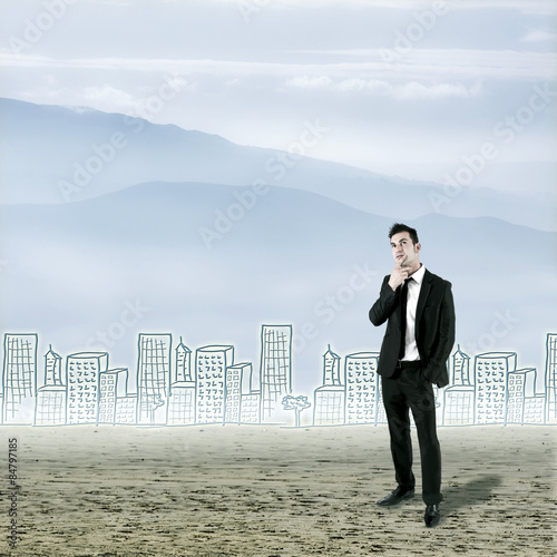 thoughtful businessman in the city photo