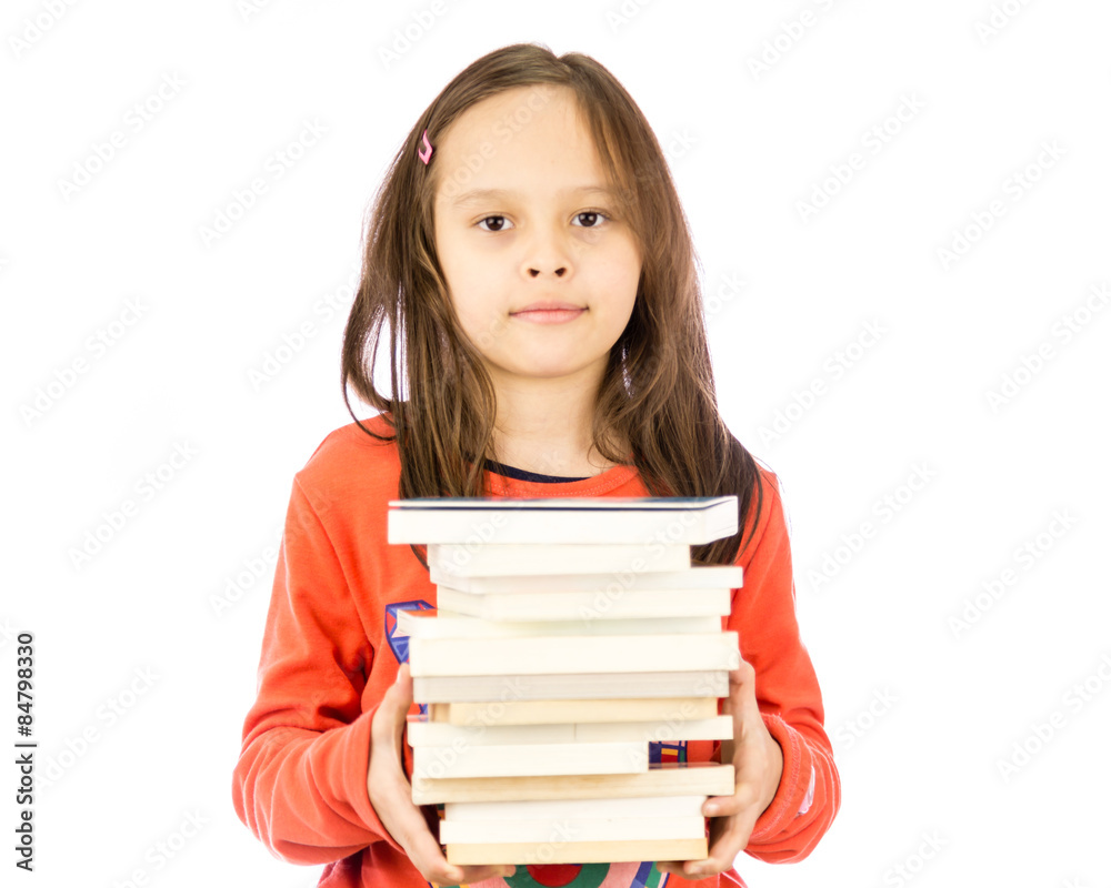 Young girl holding stack of books Young girl holding stack of books