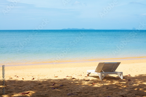 Fototapeta Naklejka Na Ścianę i Meble -  Chaise lounge on a beach