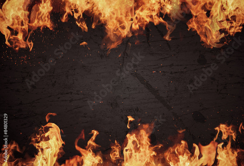 Black Grunge Background with flames photo