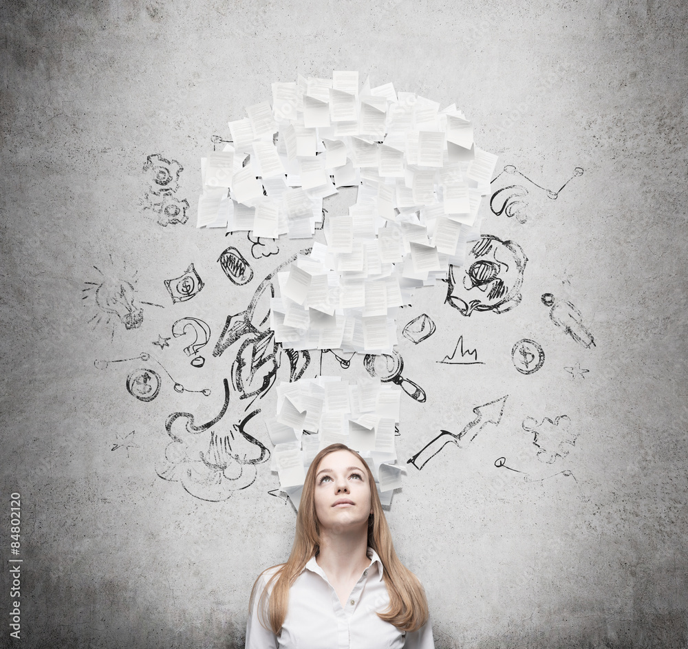 Business woman is thinking about the question mark which consists of the contract pages. Business woman is thinking about the question mark which consists of the contract pages.