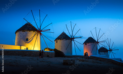 Mills on the Greek island in the sunset