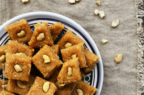 Homemade burfi - indian sweets with chickpea flour, cardamom and