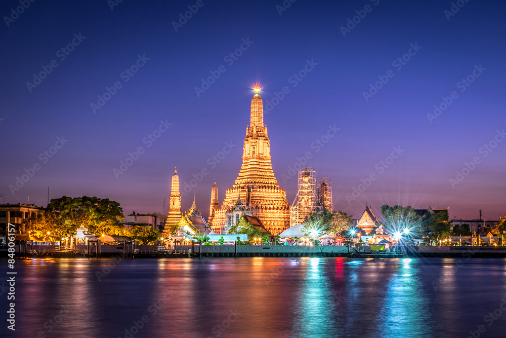 Landscape of Wat Arun at twilight time. A Buddhist temple located along the Chao Phraya river in Bangkok , Thailand