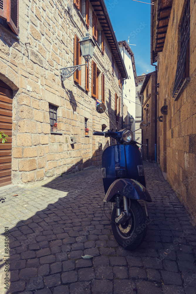 Classic Italian mode of transport through the narrow winding str