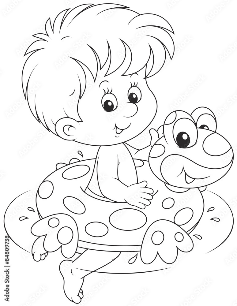 Boy swimming with a rubber ring Boy swimming with a rubber ring