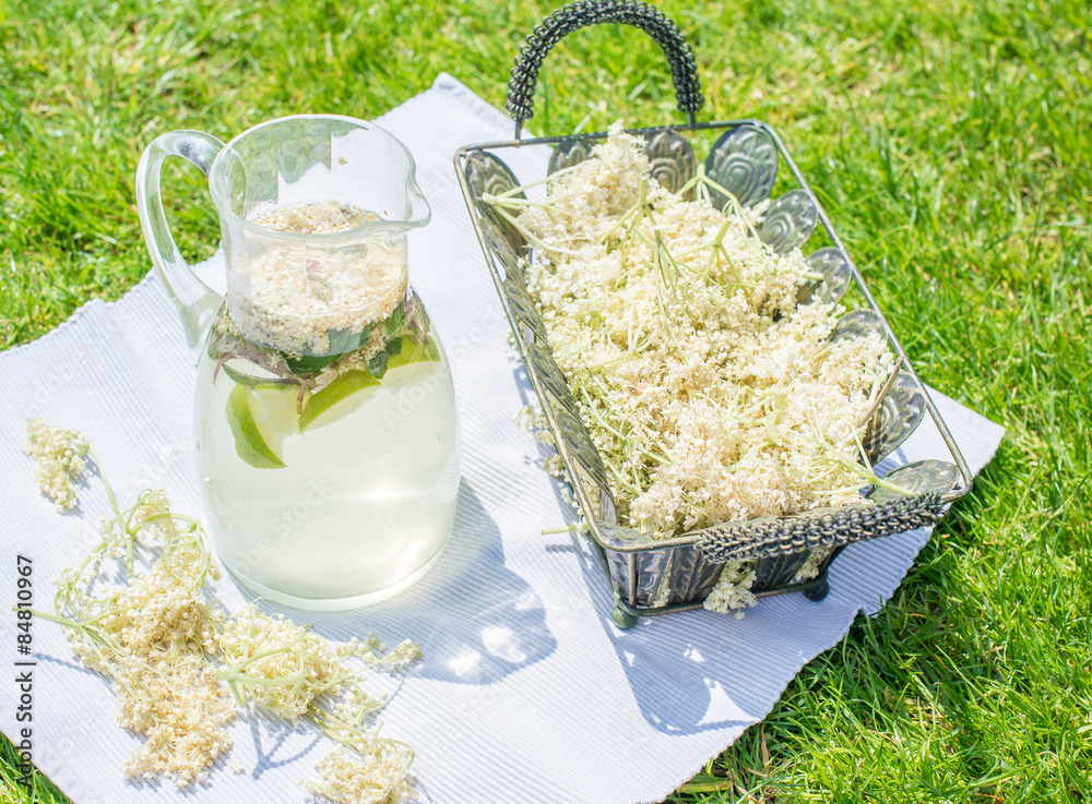 Summer cold and refreshing drink made of elder berry and limes
