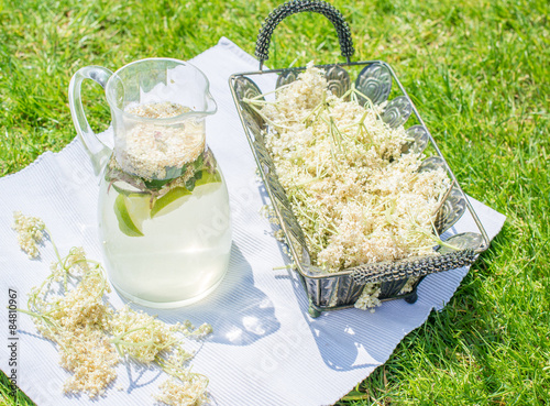 Summer cold and refreshing drink made of elder berry and limes