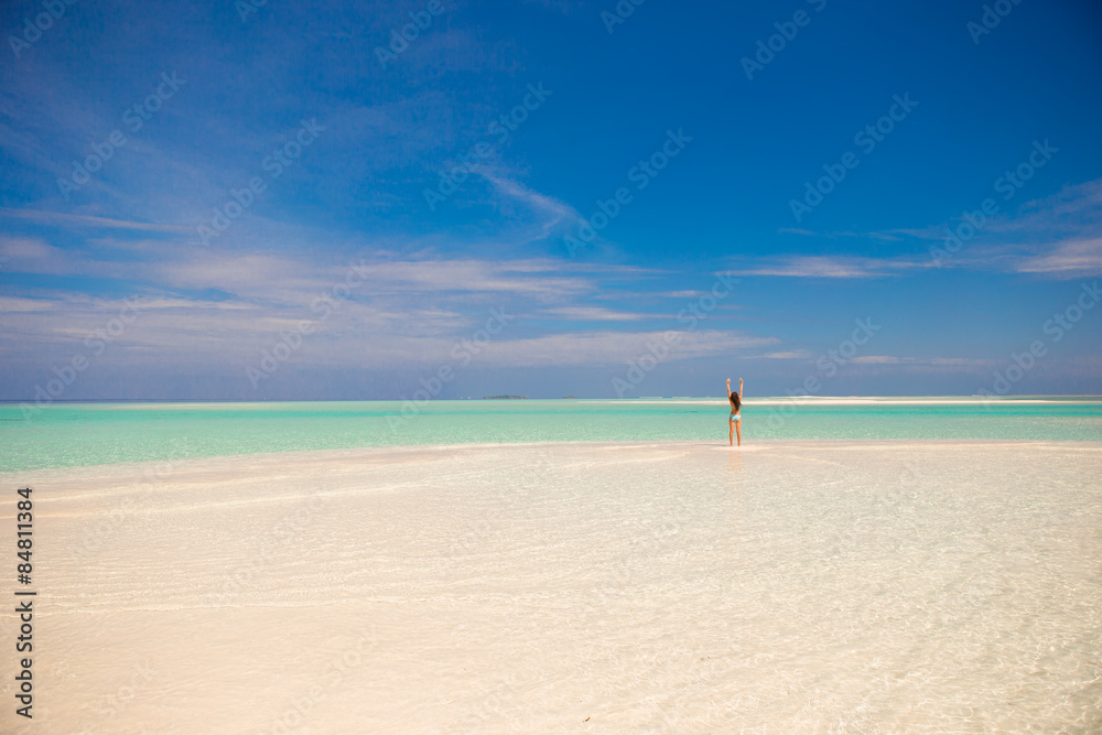 Young happy woman on white sandy beach Young happy woman on white sandy beach
