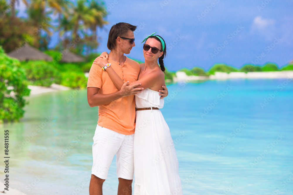 Young happy couple during beach vacation Young happy couple during beach vacation