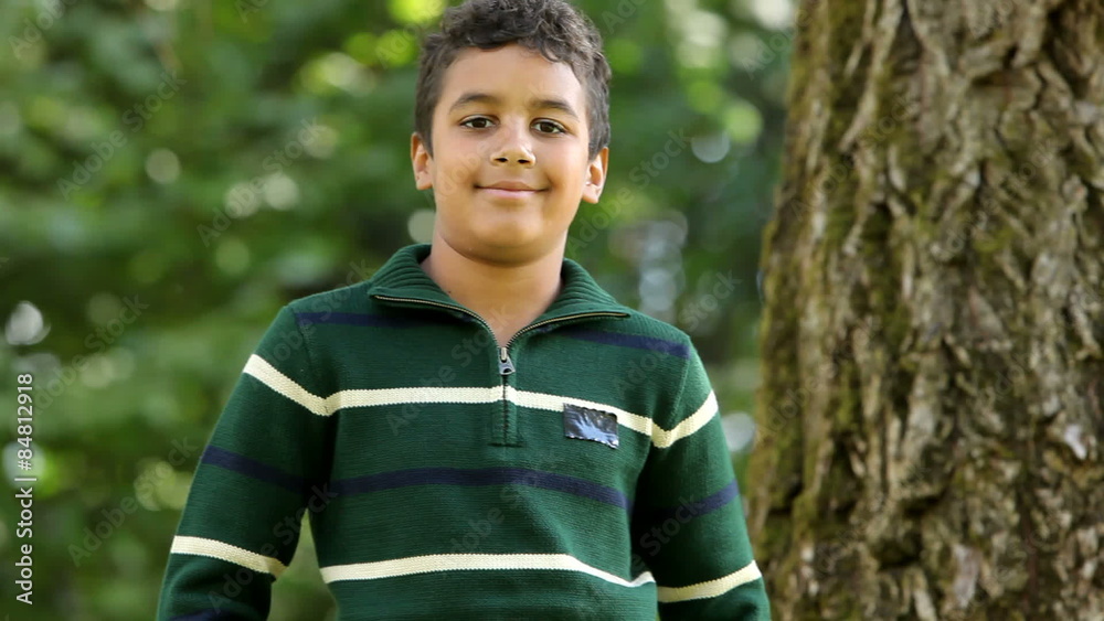 Portrait of happy mixed race boy