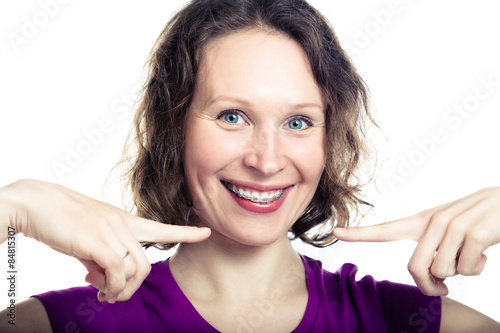 Beautiful smiling girl wearing braces.