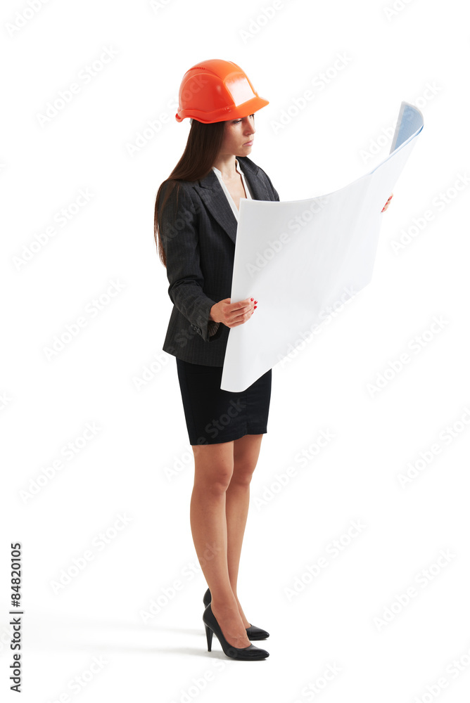 woman architect looking at plan woman architect looking at plan