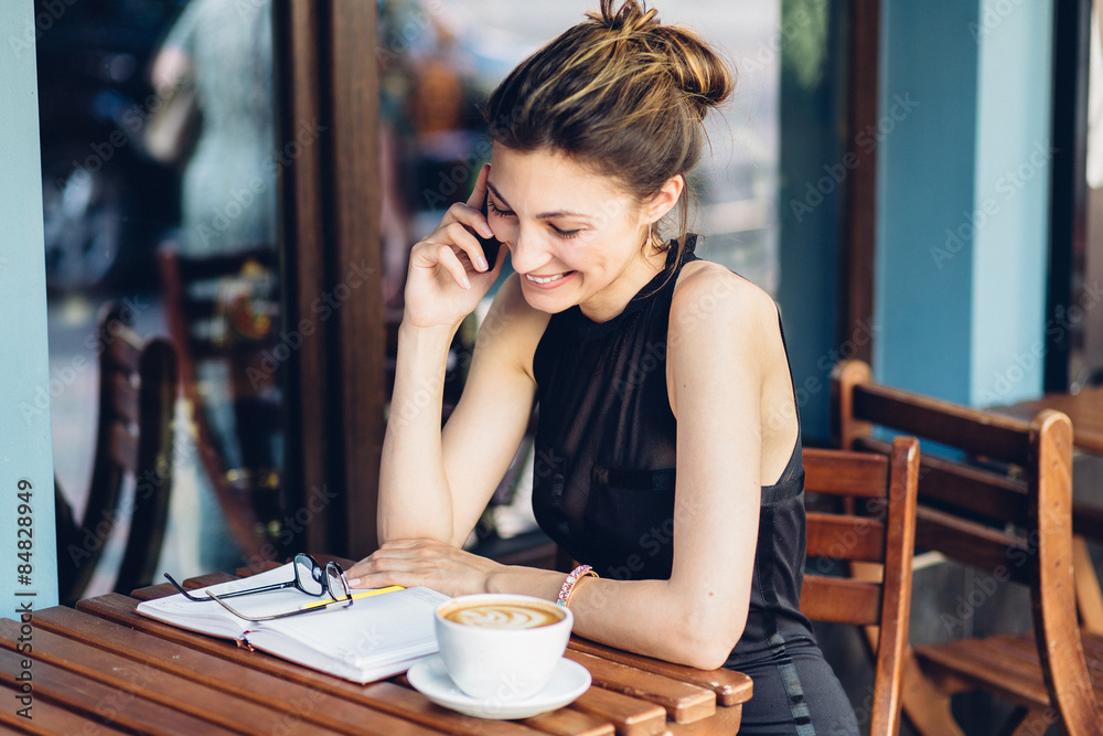 Attractive girl talking on the phone Attractive girl talking on the phone