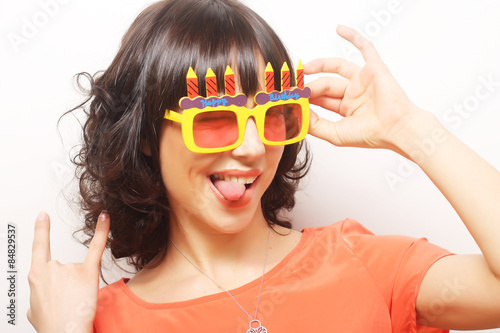 happy woman with big orange sunglasses