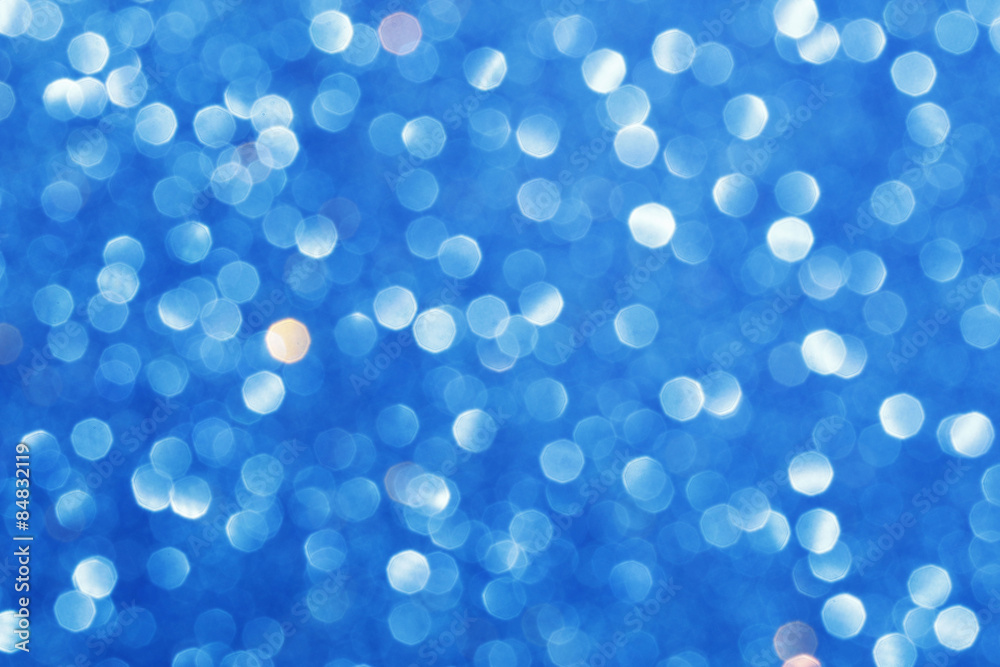 Blue blurred lights. Glittering abstract background