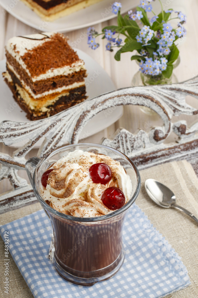 Irish coffee with cherries and tiramisu cake Irish coffee with cherries and tiramisu cake