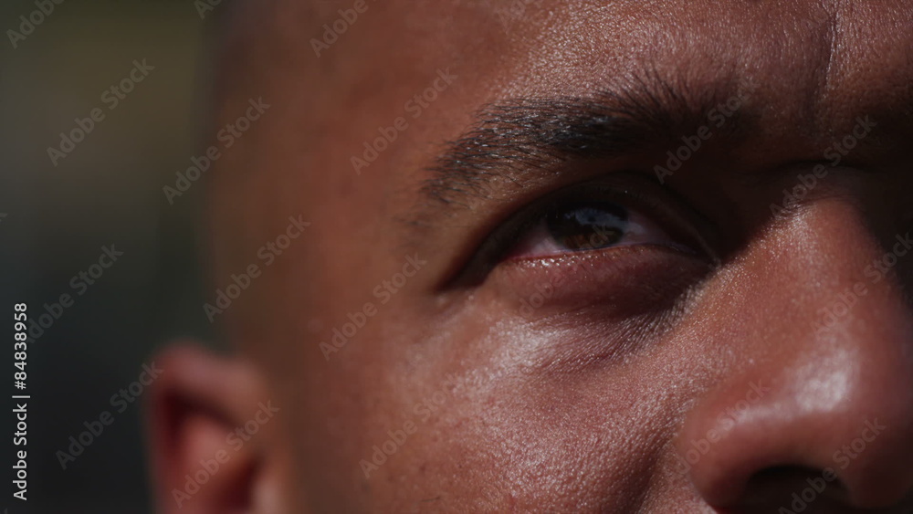 One on one street basketball; extreme closeup of players eye One on one street basketball; extreme closeup of players eye