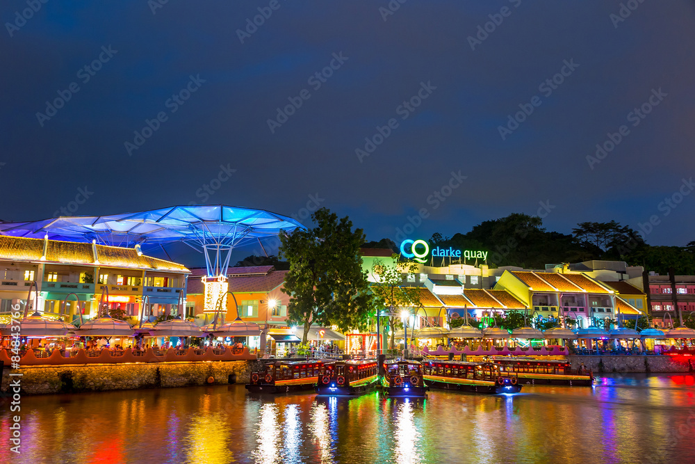 olorful light building at night in Clarke Quay, Singapore - obrazy, fototapety, plakaty 