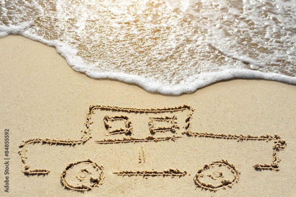 car on beach near sea