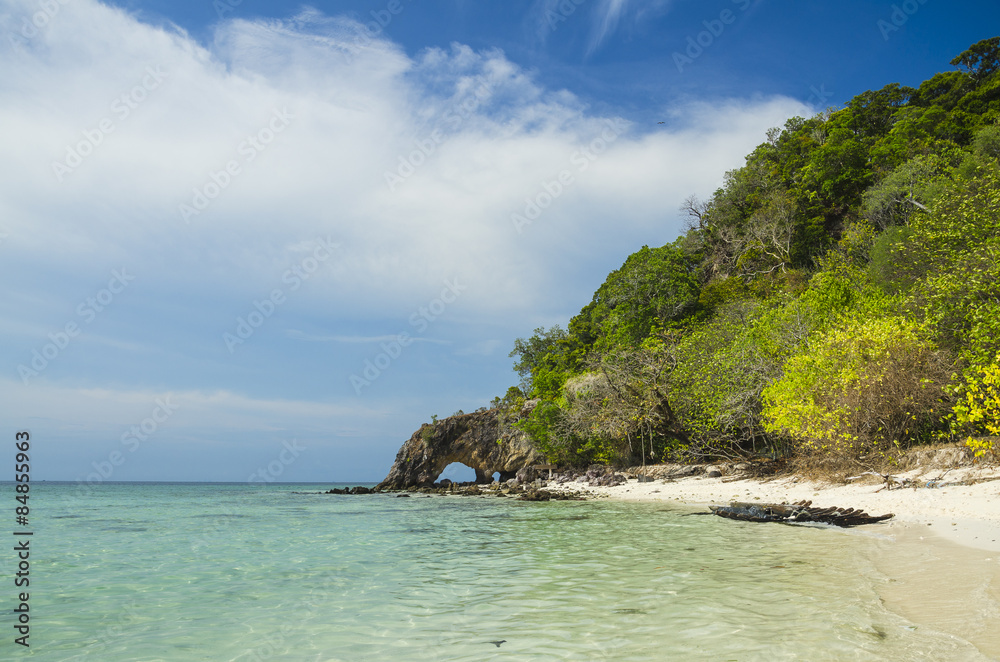 Natural stone arch with beautiful beach at Kho Khai near Tarutao Natural stone arch with beautiful beach at Kho Khai near Tarutao