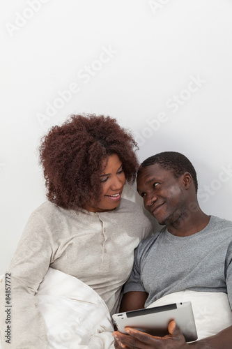 Black couple using the ipad