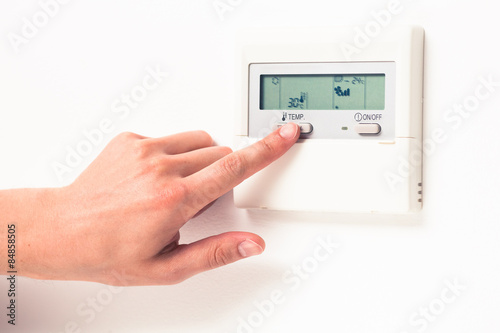 digital climate thermostat controlling by hand