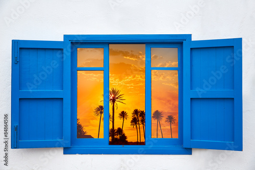 Almeria from window Cabo de Gata palm sunset photo