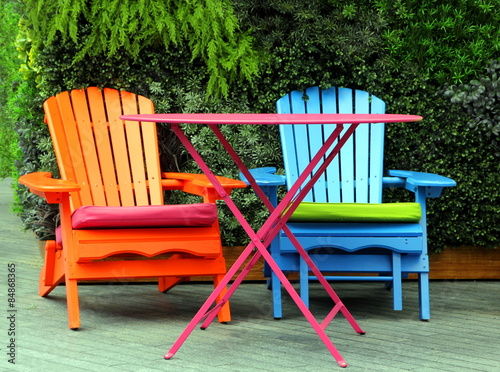 Bild auf Leinwand Brightly painted garden furniture