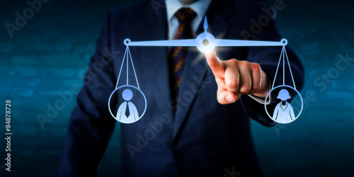 Manager Balancing Out A Female And A Male Worker