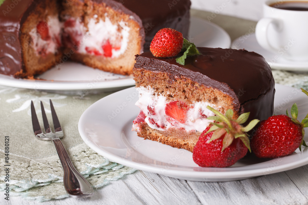 Cut cake with strawberry and chocolate close-up. Horizontal
Cut cake with strawberry and chocolate close-up. Horizontal