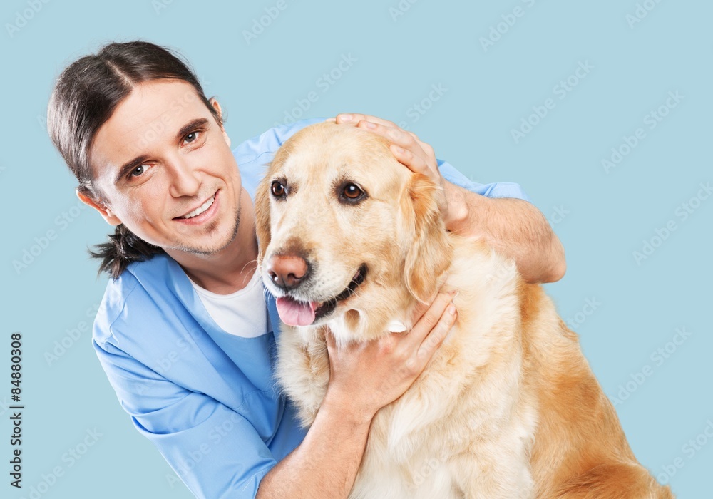 Veterinarian, dog, hugging.