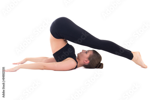beautiful sporty woman doing stretching exercise isolated on whi