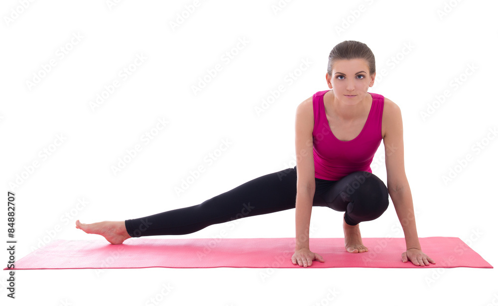 pretty slim woman doing stretching exercise on yoga mat isolated pretty slim woman doing stretching exercise on yoga mat isolated