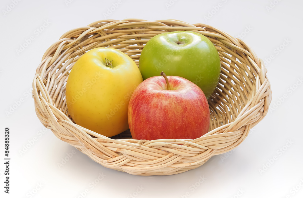 Apples in basket white background