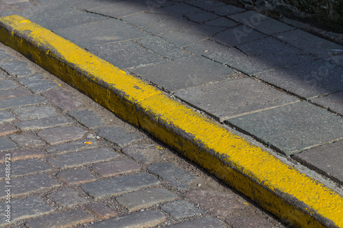 Yellow curb stone border