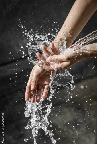 hands with water splash