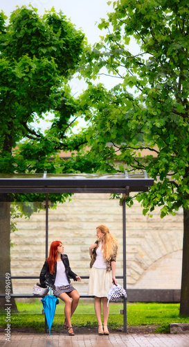 Two Girls at Bus Stop © Petr Malyshev
