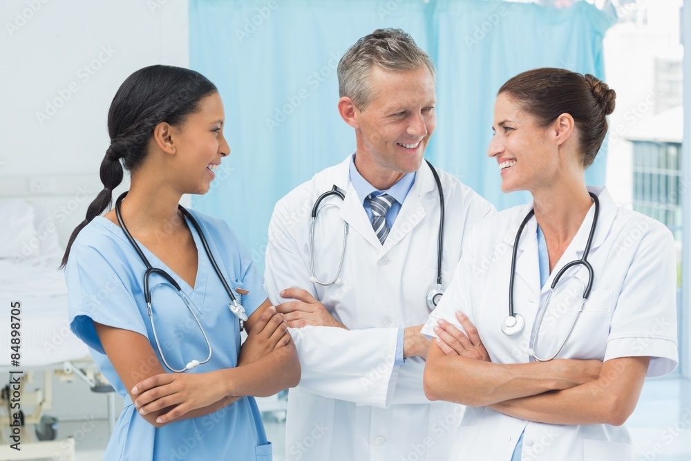 Confident male and female doctors