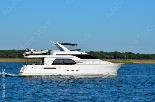 luxury yacht cruising along the river at Florida, USA