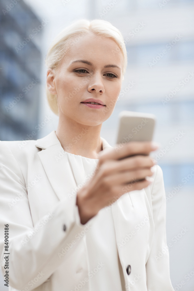 serious businesswoman with smartphone outdoors serious businesswoman with smartphone outdoors