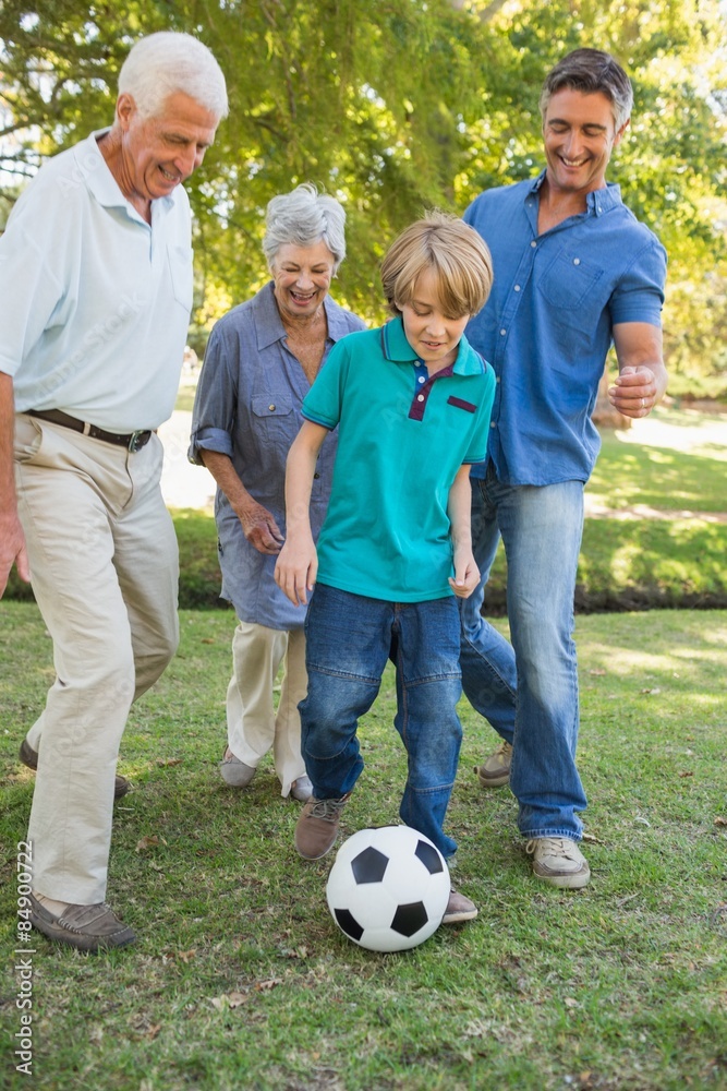 Happy family playing at the ball Happy family playing at the ball
